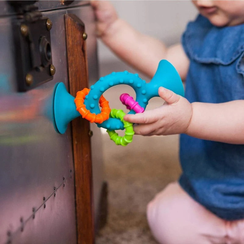 PipSquigz Loops, Mordedor y Sonajero sensorial Celeste - Fat Brain Toys