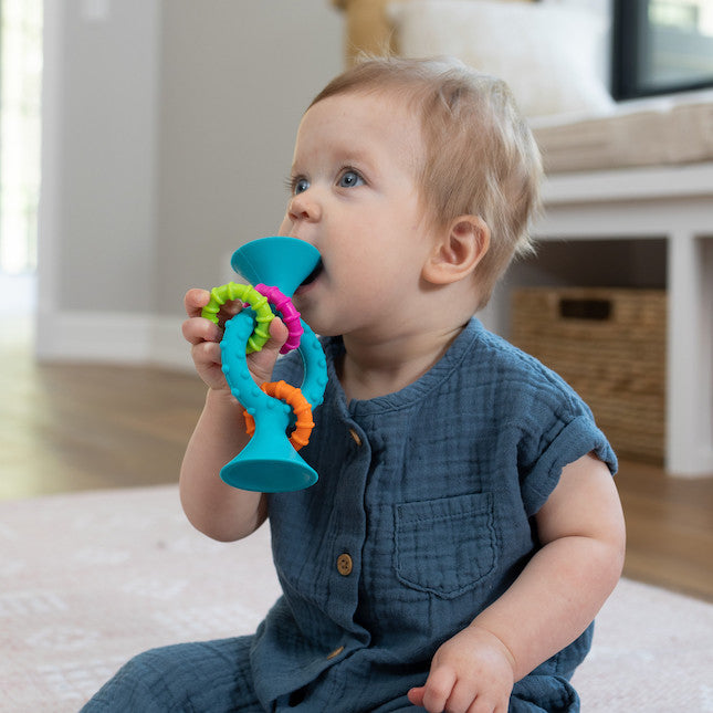 PipSquigz Loops, Mordedor y Sonajero sensorial Celeste - Fat Brain Toys