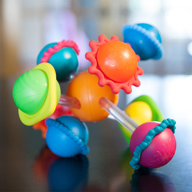 Wimzle, juguete sensorial - Fat Brain Toys